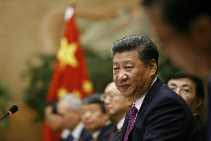 Chinese President Xi Jinping looks on during a meeting at the United Nations European headquarters in Geneva, on January 18, 2017