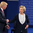 Hillary Clinton (right) and Donald Trump shake hands at the end of the second presidential debate in St. Louis, on October 9, 2016