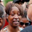 Diamond Reynolds weeps after she recounts the incidents that led to the fatal shooting of her boyfriend Philando Castile by Minneapolis area police during a traffic stop on Wednesday, at a "Black Lives Matter" demonstration in front of the Governor"s M...
