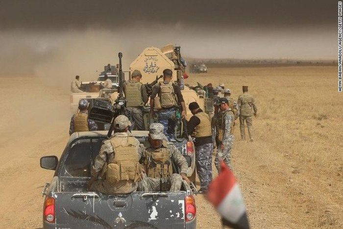 Iraqi army and militia forces arrive Thursday in Saleh village in the offensive to wrest Mosul from ISIS.