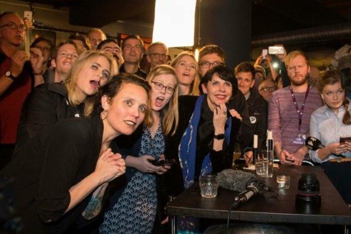 Politician and co founder of Iceland's Pirate Party Birgitta Jonsdottir (C), Asta Gudrun Helgadottir (2nd,L) are seen alongisde party members after parliamentary elections in Iceland, on October 25, 2016