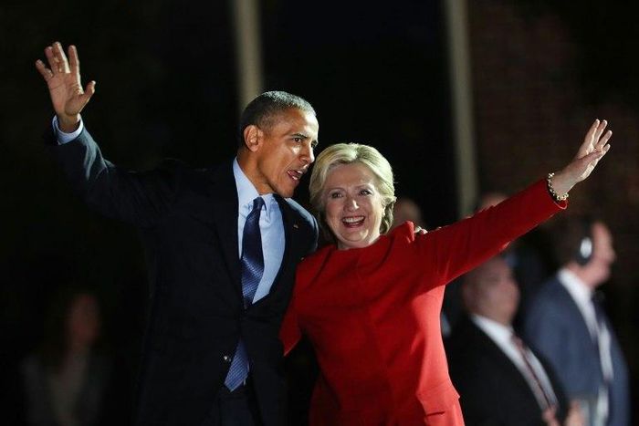 Hillary Clinton stands with Barack Obama at an election eve rally on November 7, 2016 in Philadelphia, Pennsylvania