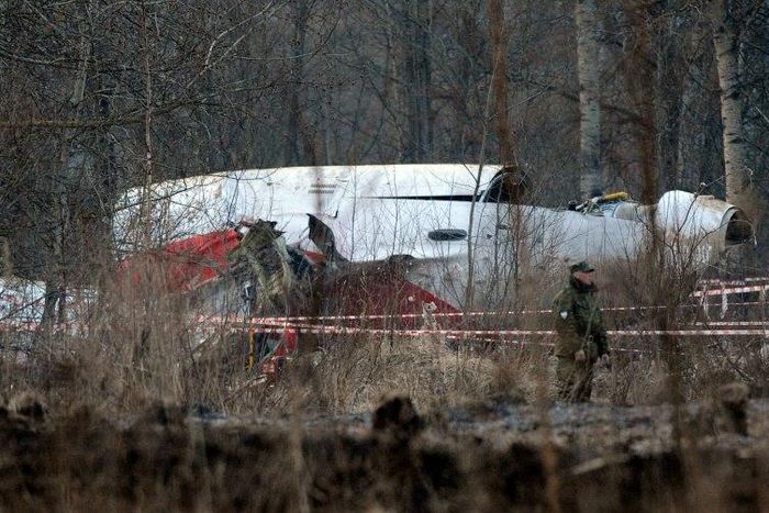 A Russian soldier stands guard on April 11, 2010 near the wreckage of a Polish government Tupolev Tu-154 aircraft which crashed on near Smolensk airport