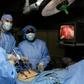 Surgeons perform laparoscopic stomach surgery