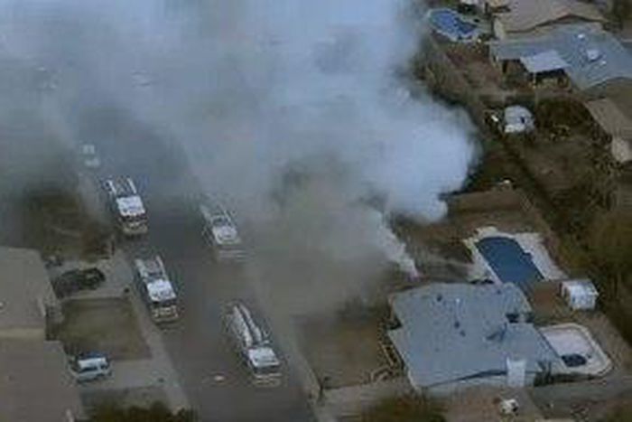 Mike Assi's burning house.