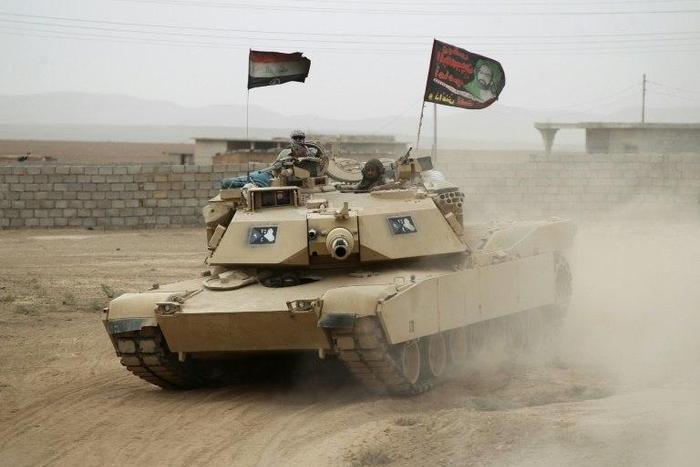 Soldiers from Iraq's 16th Division retook a series of villages north of Mosul, while pro-government paramilitary forces said they captured villages southwest of the city