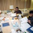 Udoma Udo Udoma meeting President Buhari and Yemi Osinbajo to scrutinize the 2016 budget