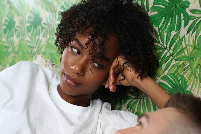 Womman giving her man the side eye [Credit: Bustle]