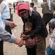 A displaced boy, who fled the violence in Mosul, receives a measles vaccination from a UNICEF-supported health worker in Ibrahim Khalil village in Hamdaniyah, Iraq October 24, 2016. Picture taken October 24, 2016.