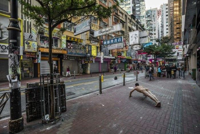 Ou Zhihang's photographs himself exercising nude at sites such as the Hong Kong bookstore linked to the disappearance of five booksellers