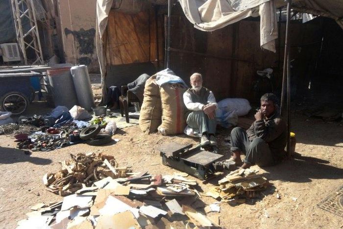 Men sell wood outside in the Syrian city of Deir Ezzor, parts of which were siezed by the Islamic State in 2014 after the group's lightning advance across large areas of Syria and neighbouring Iraq