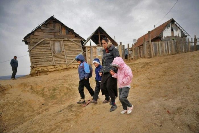 EU statistics agency Eurostat found that 46.8 percent of Romanian children, as pictured here in a village north of Bucharest, are at risk of poverty and social exclusion