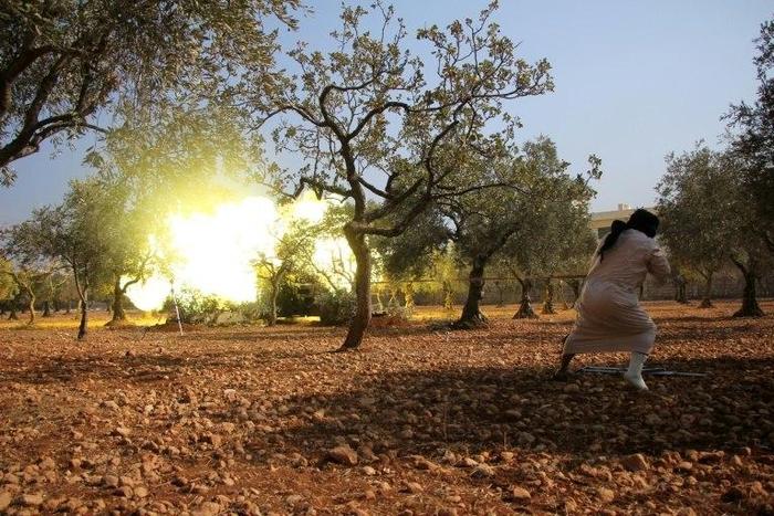 Rebel fighters from the Jaish al-Fatah (or Army of Conquest) brigades fire mortar shells towards western government-controlled districts at the entrance to Aleppo, in the southwestern frontline neighbourhood of Dahiyet al-Assad on October 30, 2016