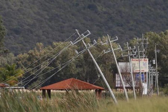 Electricity poles impacted by wind after the passing of Hurricane Patricia are seen in La Union de Tula, Mexico October 24, 2015.