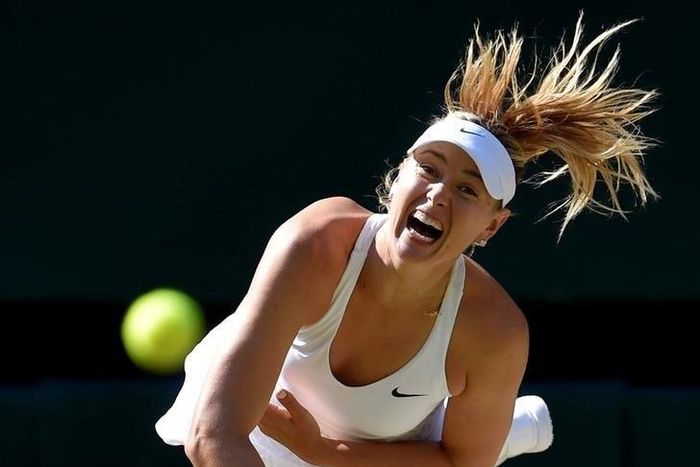 Sharapova says she cannot wait to return after ban reduced