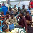Australia-bound Sri Lankan asylum-seekers are seen off western Sumatra, after being intercepted by Indonesian authorities