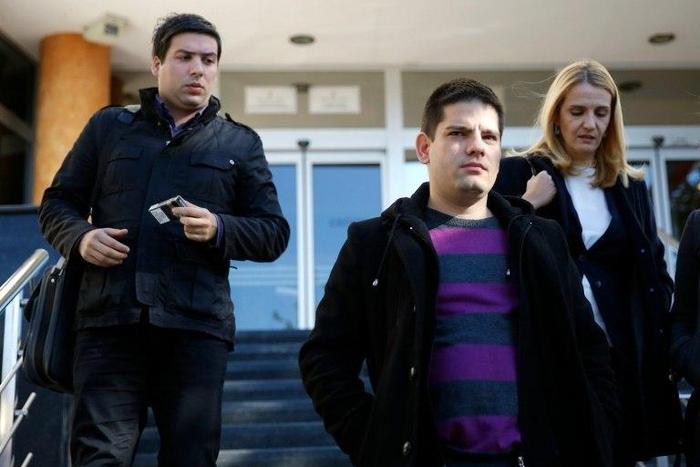 Damir Prenkovic (C), father of two-year old girl Masha who was kidnapped in 2015, leaves a Belgrade court after the verdict on October 20, 2016
