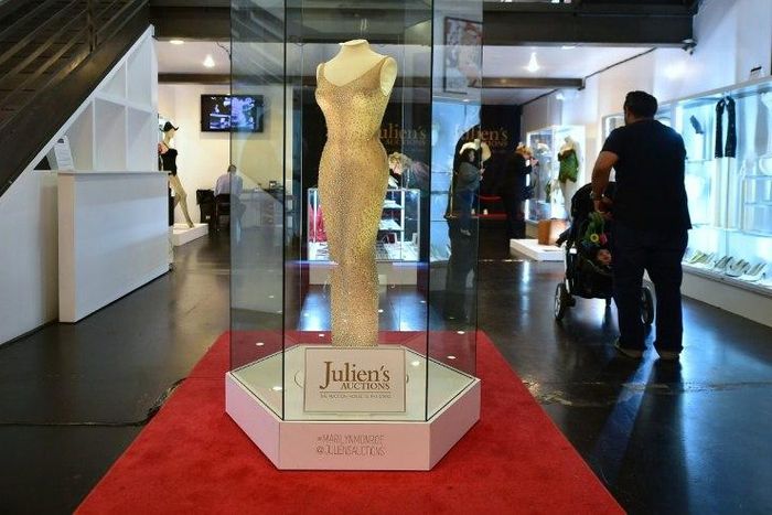 The dress worn by Marilyn Monroe when she sang "Happy Birthday Mr. President" to John F. Kennedy, in May 1962, is displayed in a glass enclosure at Julien's Auction House in Los Angeles, California on November 17, 2016