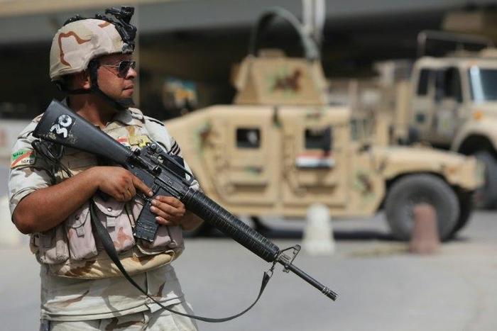 A suicide attack on an Iraqi army checkpoint, south of Baghdad, came as government forces launched an offensive to retake Mosul from the Islamic State group