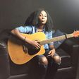 Aramide with her guitar