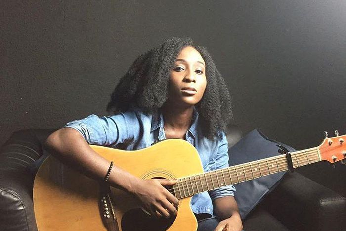 Aramide with her guitar