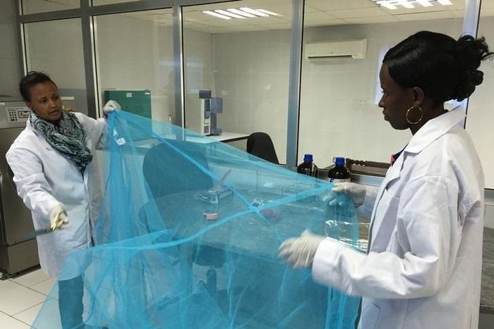 Workers look for holes in mosquito netting at the A to Z Textile Mills factory producing insecticide-treated bednets in Arusha, Tanzania, May 10, 2016.