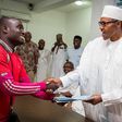 Suleiman Hashimu being congratulated by PMB on the completion of his first mission