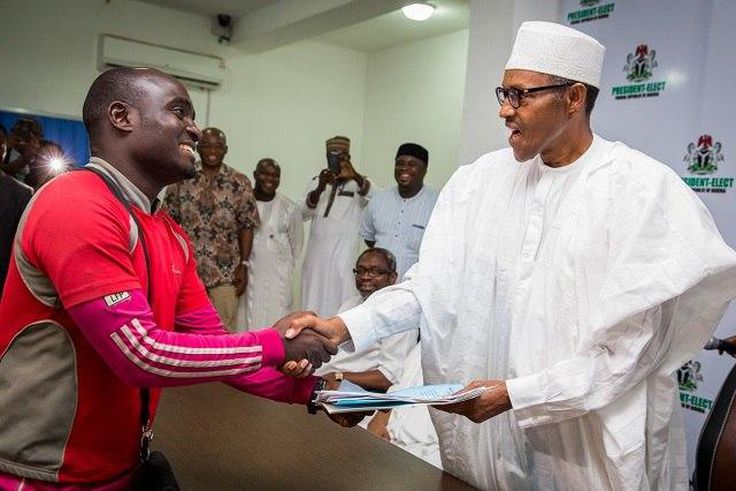 Suleiman Hashimu being congratulated by PMB on the completion of his first mission