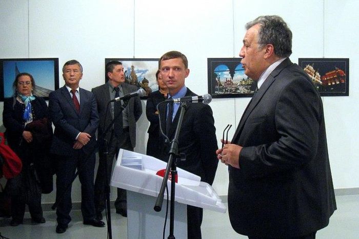 Andrei Karlov, the Russian ambassador to Ankara, gives a speech before being shot dead by a gunman at an art exhibition in Ankara on December 19, 2016
