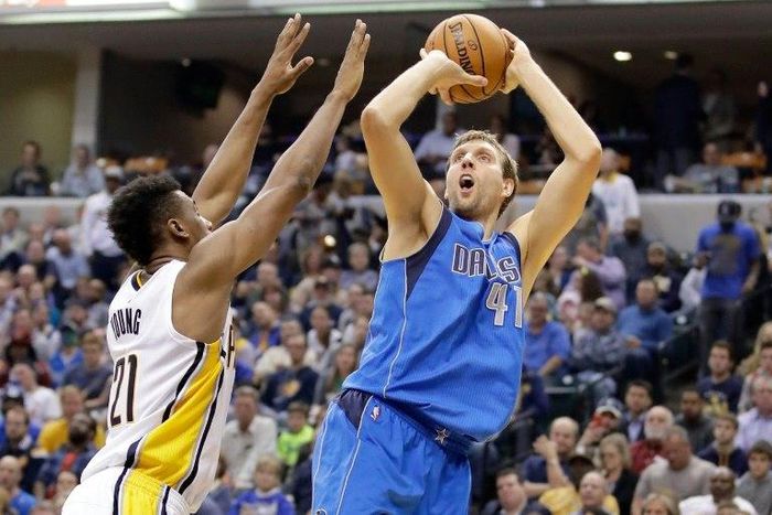 Dirk Nowitzki (right) says he could retire as early as next year, but admits his dream is to play until 2018