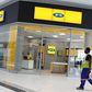 A worker walks past an outlet of South Africa's MTN Group in Johannesburg, South Africa, February 23, 2016. REUTERS/Siphiwe Sibeko/File Photo