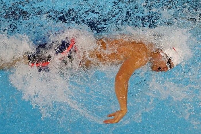 Michael Andrew of the US swims the 3rd leg of the 4x50m freestyle preliminary, during the 13th FINA Short Course World Swimming Championships, in Windsor, Ontario, Canada, on December 9, 2016