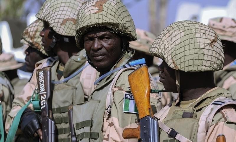 Nigerian Army soldiers stand as part of preparations for deployment to Mali, at the Nigerian Army peacekeeping centre in Jaji, near Kaduna January 17, 2013.  REUTERS/Afolabi Sotunde