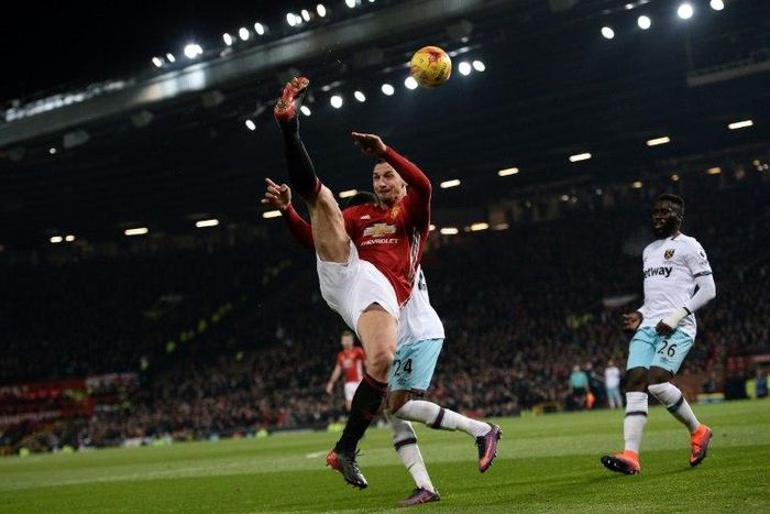 Manchester United's Zlatan Ibrahimovic makes an acrobatic cross during their League Cup quarter-final against West Ham