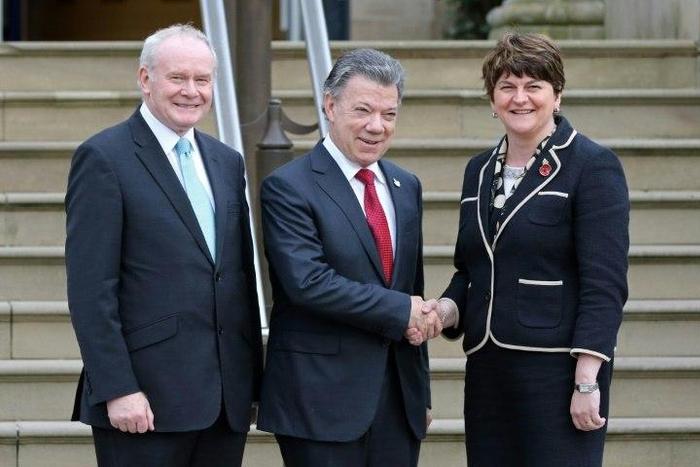 Colombian President Juan Manuel Santos (C) poses for a photograph with Northern Irish First Minister Arlene Foster (R) and Northern Irish deputy First Minister Martin McGuinness (L) as he arrives at Stormont Castle in Belfast on November 3, 2016