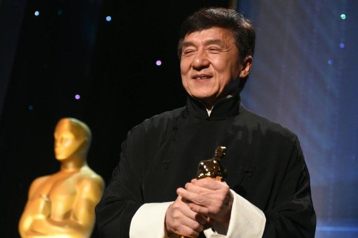 Jackie Chan poses with his Honorary Oscar Award during the 8th Annual Governors Awards in Hollywood, California