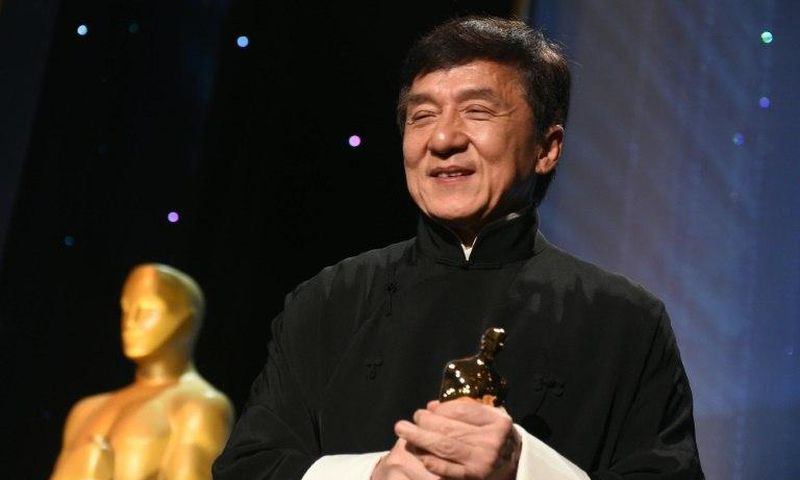 Jackie Chan poses with his Honorary Oscar Award during the 8th Annual Governors Awards in Hollywood, California