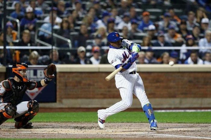 Yoenis Cespedes of the New York Mets bats against the San Francisco Giants in the first inning during their National League Wild Card game at Citi Field on October 5, 2016 in New York City