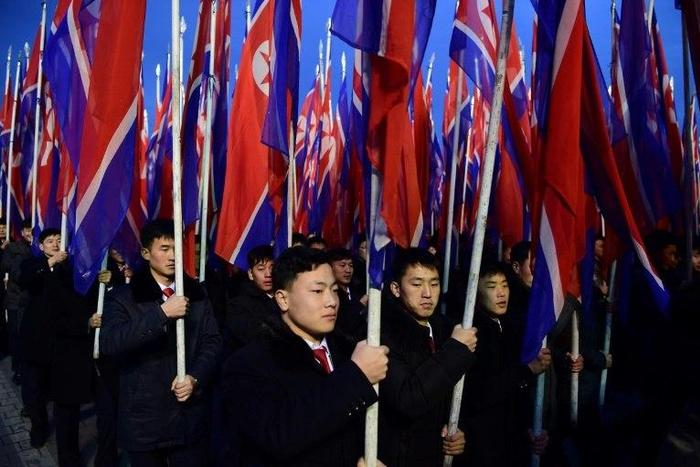 New Year rallies in Pyongyang were attended by thousands chanting communist slogans and support for leader Kim Jong-un