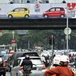 The X-rated clip was seen by motorists as they crawled along the major road in Jakarta