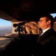 French President Francois Hollande looks at Islamic State-held territory as he visits a military outpost on the outskirts of the northern city of Mosul, on January 2, 2017
