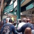 Onlookers view a New Jersey Transit train that derailed and crashed through the station in Hoboken, New Jersey, U.S. in this picture courtesy of Chris Lantero taken September 29, 2016.