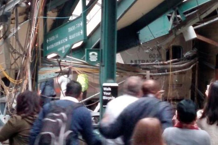 Onlookers view a New Jersey Transit train that derailed and crashed through the station in Hoboken, New Jersey, U.S. in this picture courtesy of Chris Lantero taken September 29, 2016.