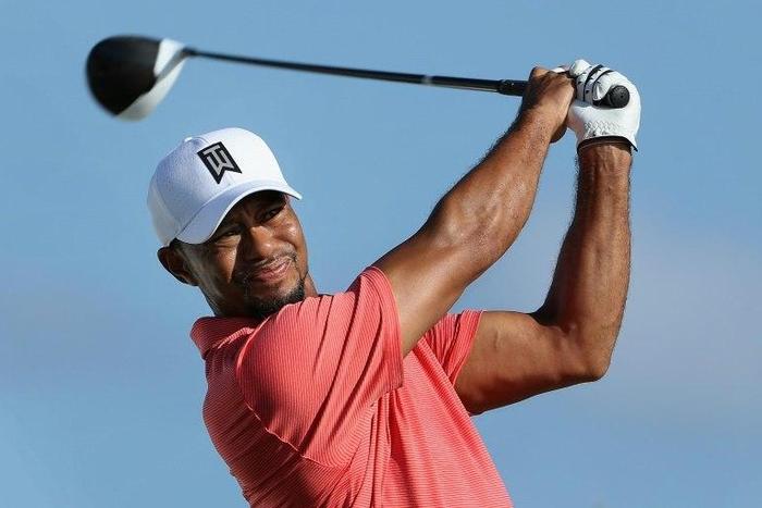 Tiger Woods of the United States hits a tee shot on the fourth hole ahead of the Hero World Challenge at Albany, The Bahamas on November 30, 2016