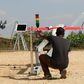 A technician of California-based robotics company Zipline launches a drone in Muhanga, west of the capital Kigali on October 12, 2016