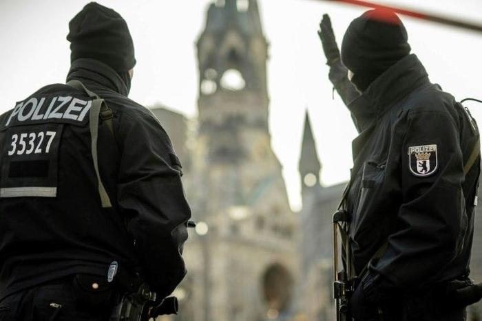 German police patrol near Berlin's Kaiser Wilhelm Memorial Church on December 21, 2016