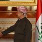 Iraqi Kurdish leader Massud Barzani (R) shakes hands with US Secretary of Defence Ashton Carter ahead of a meeting on October 23, 2016 in Arbil