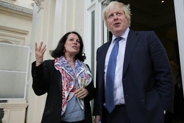 British Foreign Secretary Boris Johnson (R) talks with French Ambassador to Britain, Sylvie Bermann as he attends a reception at the French Ambassador's residence in west London on July 14, 2016
