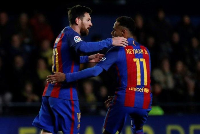 Barcelona's forward Lionel Messi (L) celebrates with Neymar after scoring on January 8, 2017
