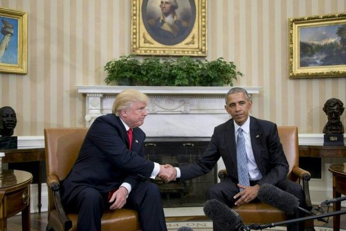 US President Barack Obama shakes hands with President-elect Donald Trump in the Oval Office at the White House on November 10, 2016